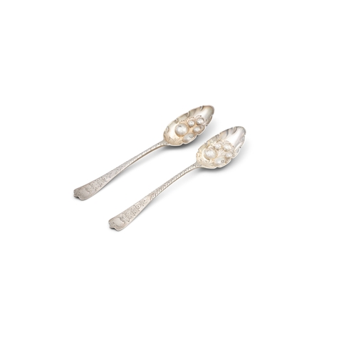 110 - A PAIR OF GEORGIAN SILVER BERRY SPOONS  London, c. 1791, makers mark rubbed, with later Victorian de... 