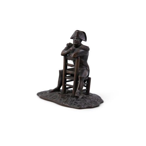 121 - A BRONZE MODEL OF THE SEATED NAPOLEON,  After the painting 'Veille de la Bataille d'Austerlitz' by E... 