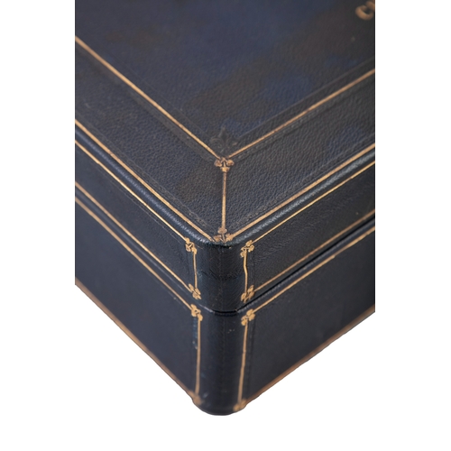 123 - TWO EDWARDIAN NAVY BLUE AND GILT DECORATED LEATHER COVERED BOXES BY A. ARMSTRONG OF DUBLIN,   both w... 