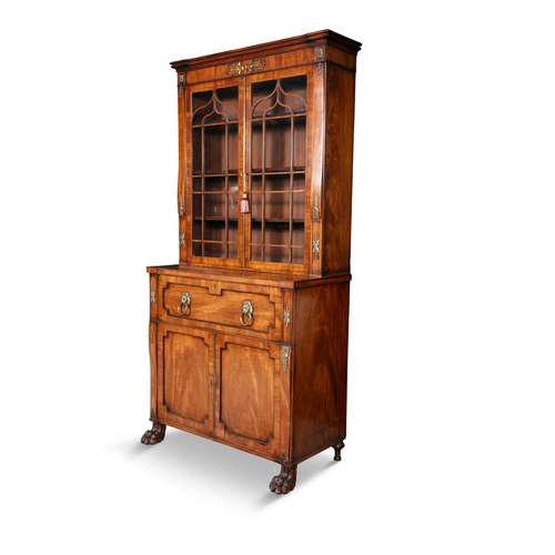 127 - A GEORGE IV INLAID MAHOGANY SECRETAIRE BOOKCASE CIRCA 1820  fitted with moulded outset cornice above... 