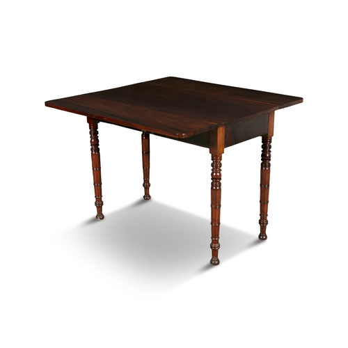 134 - A VICTORIAN MAHOGANY DOUBLE DROP LEAF TABLE    of rectangular form on ring turned tapering legs and ... 