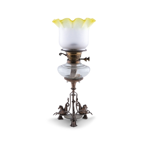 142 - TWO BRASS AND GLASS RESERVOIR OIL LAMPS,  the larger measuring 60cm high with shade; the smaller 43c... 