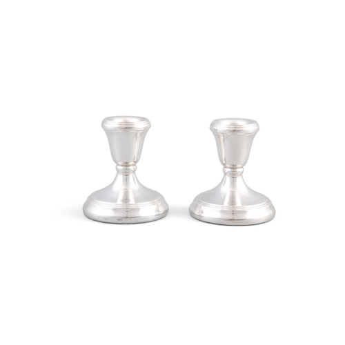 168 - A MODERN PAIR OF DESK CANDLESTICK HOLDERS   Birmingham, mark of L J Millington, the sockets with ree... 