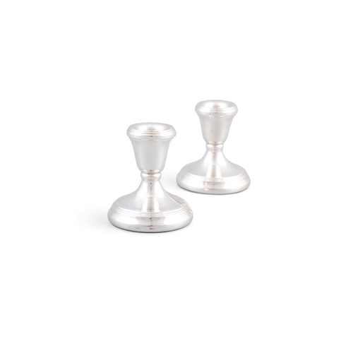 168 - A MODERN PAIR OF DESK CANDLESTICK HOLDERS   Birmingham, mark of L J Millington, the sockets with ree... 