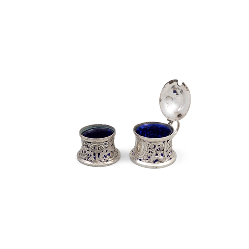 169 - AN IRISH SILVER OPEN SALT AND MUSTARD POT,  Dublin c.1929, mark of S H Waterhouse,  with blue glass ... 