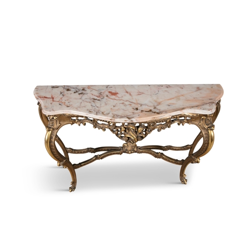 186 - A CONTINENTAL GILTWOOD MARBLE TOP SIDE TABLE 20TH CENTURY,   of serpentine shape fitted with mottled... 