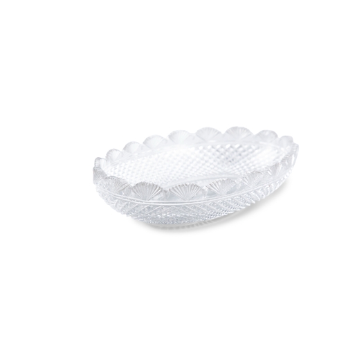 187 - AN IRISH CUT GLASS OVAL BOWL, 19TH CENTURY,  the rim cut with repeating fan shaped panels, over a bo... 