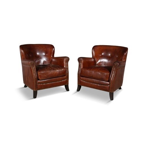 204 - A PAIR OF BROWN LEATHER UPHOLSTERED ARMCHAIRS,   each with buttoned tub shaped back, loose seat cush... 