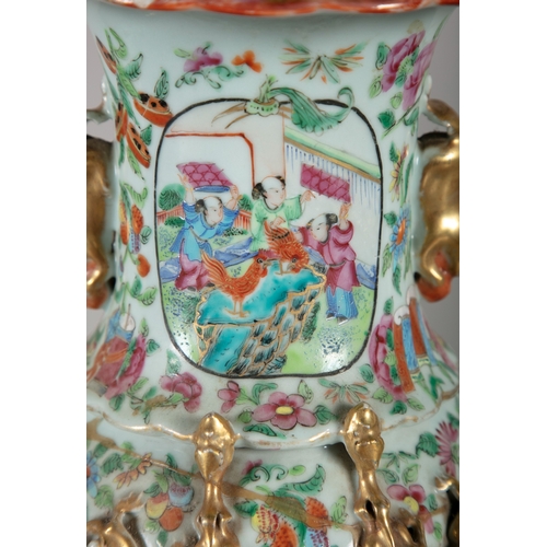 215 - A PAIR OF CHINESE CANTON VASES  the flared rims, baluster bodies decorated in the traditional taste ... 