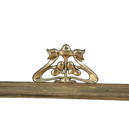 222 - AN ART NOUVEAU BRASS RAIL FENDER   with triform foliate motifs and fire iron support rails, 141cm wi... 