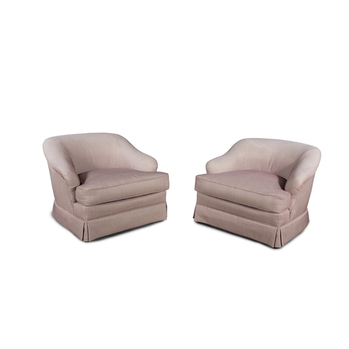 224 - A PAIR OF HOWARD STYLE ARMCHAIRS,   upholstered in pink and white woven fabric, raised on short maho... 