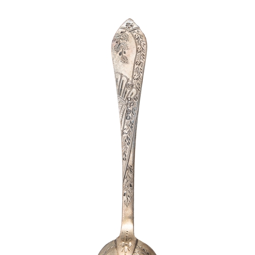 233 - A CASED VICTORIAN CHRISTENING SET COMPRISING AN ELABORATLEY ENGRAVED SPOON AND MATCHING FORK,  Londo... 