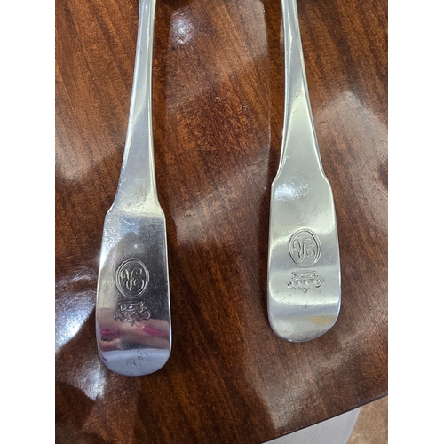 234 - A PAIR OF IRISH PROVINCIAL SILVER FIDDLE PATTERN SERVING SPOONS   stamped 'GIBSON', also stamped wit... 