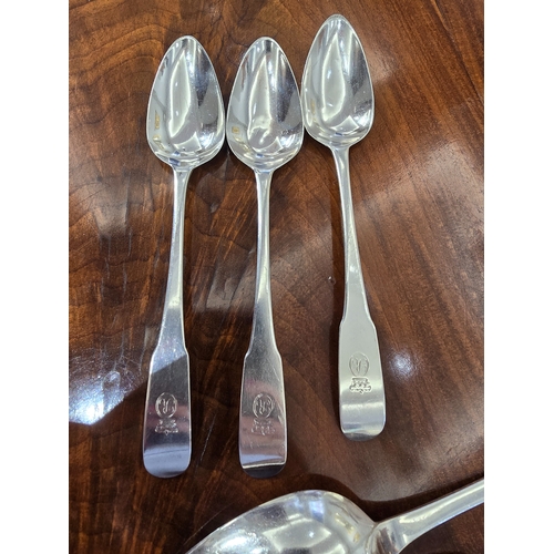 234 - A PAIR OF IRISH PROVINCIAL SILVER FIDDLE PATTERN SERVING SPOONS   stamped 'GIBSON', also stamped wit... 