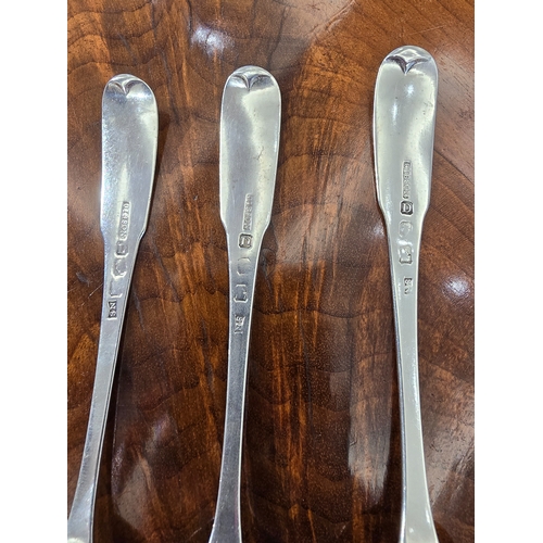 234 - A PAIR OF IRISH PROVINCIAL SILVER FIDDLE PATTERN SERVING SPOONS   stamped 'GIBSON', also stamped wit... 