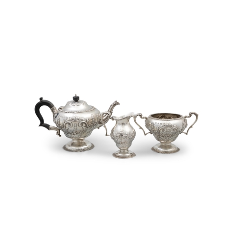 243 - A SILVER THREE PIECE TEA SET  Birmingham, c.1903, mark of Williams (Birmingham) Ltd, comprising a te... 