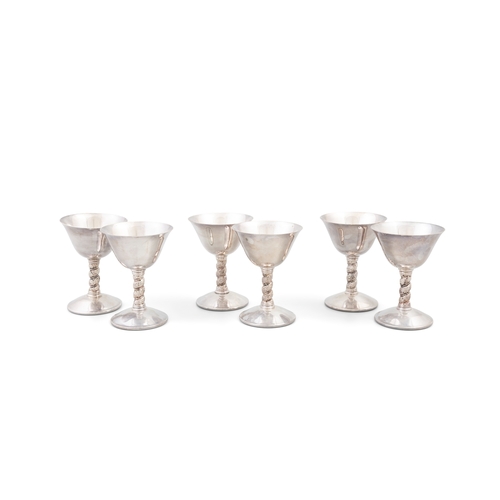 249 - A SET OF SIX SILVER PLATED GOBLETS,  with mark of Mappin & Webb, with twisted cast vine stems. 12.5c... 