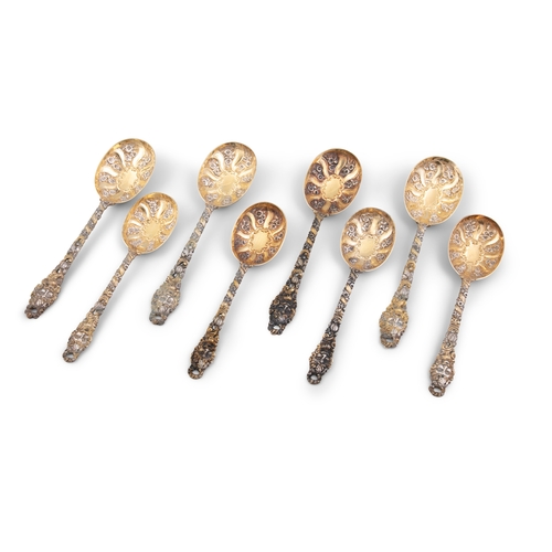 257 - A SET OF VICTORIAN SILVER GILT 'BACCHANALIAN PATTERN FRUIT SERVING DISHES AND SPOONS   London, c.189... 