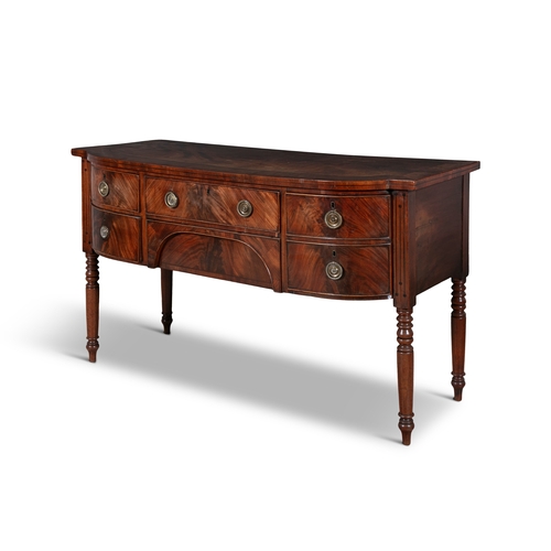 262 - A GEORGE IV MAHOGANY BOWFRONT SIDEBOARD,   the cross banded top above a long frieze drawer and reces... 