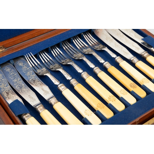 263 - A VICTORIAN CANTEEN OF TWELVE SILVER PLATED AND BONE HANDLED FISH KNIVES AND FORKS, WITH ENGRAVED DE... 