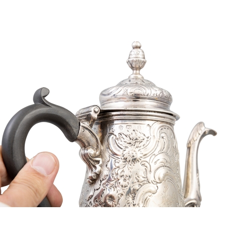 264 - A GEORGE II SILVER COFFEE POT,  London, c.1750, makers mark rubbed, the hinged dome lid with acorn f... 