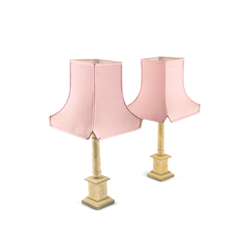 269 - A PAIR OF CREAM PAINTED TIMBER TABLE LAMPS  each of classical shape, painted with foliate sprays in ... 