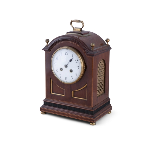 290 - A MAHOGANY CASED FRENCH MANTLE CLOCK, 19TH CENTURY  with brass carrying handle, arched top surmounte... 