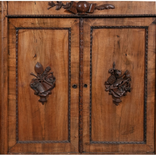 298 - A PAIR OF MID 19TH CENTURY CONTINENTAL CARVED AND STAINED WALNUT RECTANGULAR SIDE CABINETS,   the to... 