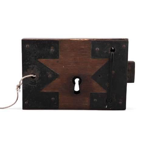 300 - A 19TH CENTURY DOOR LOCK  with cast iron mounts, with key. 20 x 14cm