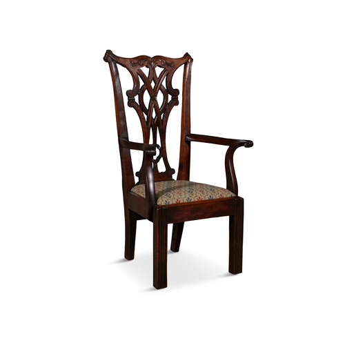 350 - A MAHOGANY FRAMED 'CHIPPENDALE' INFANTS ARMCHAIR  the pierced vase shaped back above upholstered dro... 