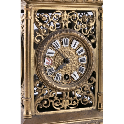 355 - A FRENCH CAST BRASS 'LANTERN' MANTLE CLOCK,  c. 1920, surmounted with a lion holding an armorial shi... 