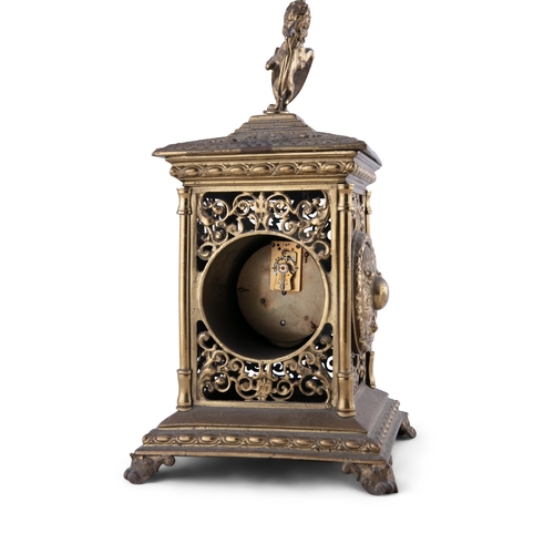 355 - A FRENCH CAST BRASS 'LANTERN' MANTLE CLOCK,  c. 1920, surmounted with a lion holding an armorial shi... 