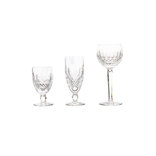 379 - A SET OF EIGHT WATERFORD CRYSTAL TALL STEMMED CUT GLASS WINE GLASSES;  together with a set of eight ... 