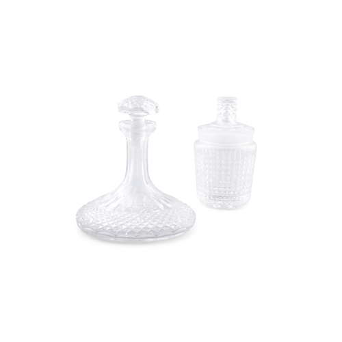 383 - A CUT GLASS SHIPS DECANTER AND ICE BUCKET,  probably Waterford Crystal, the decanter 23cm high.