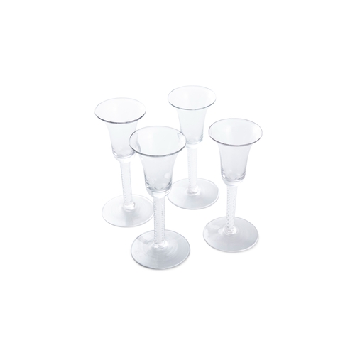 385 - A SET OF FOUR 18TH CENTURY MULTI-SPIRAL AIR TWIST WINE GLASSES, 15.5cm high