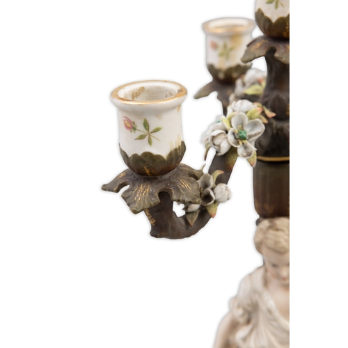 387 - A PAIR OF 19TH CENTURY GERMAN PORCELAIN FIGURAL CANDELABRA,   with four light, three branch detachab... 