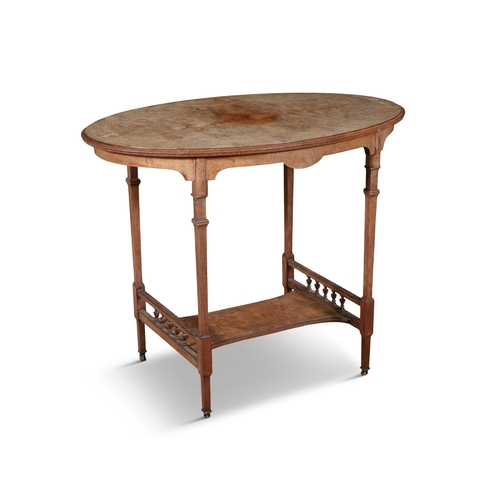 392 - A BURR WALNUT OVAL OCCASIONAL TABLE CIRCA 1900,   by Oliver & Sons, the moulded top supported on squ... 