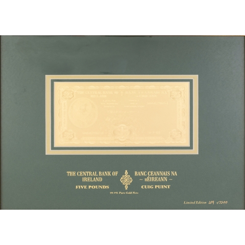 408 - A FRAMED LIMITED EDITION GOLD FIVE POUND NOTE  issued by the Central Bank of Ireland, marked '99.9% ... 