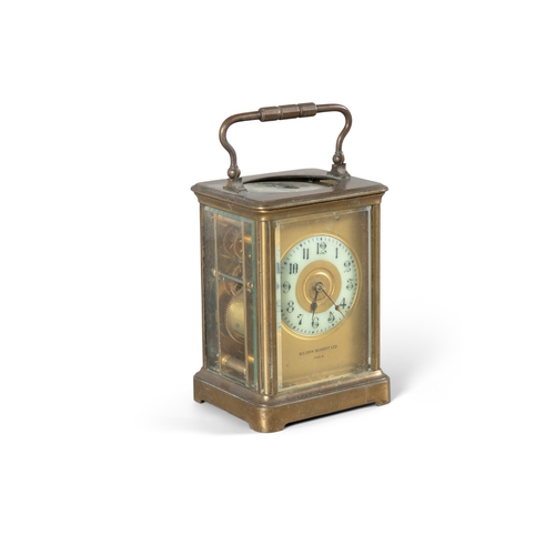 409 - A FRENCH BRASS CASED CARRIAGE CLOCK,   retailed by 'Sir John Bennett, Paris', fitted with five bevel... 