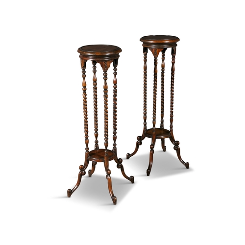 413 - A PAIR OF BEECHWOOD JARDINERE STANDS   with circular tops, spiral turned legs, conforming undertier.... 