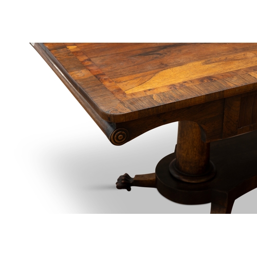 421 - A WILLIAM IV ROSEWOOD LIBRARY TABLE  of rectangular form, with twin frieze drawers and roundel termi... 