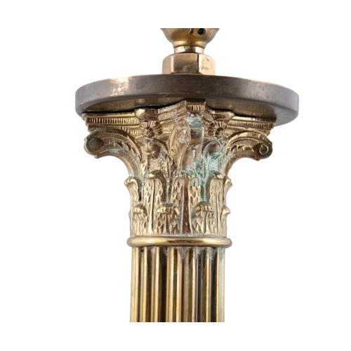 43 - A 19TH CENTURY BRASS TABLE LAMP IN THE FORM OF A CORNINTHIAN COLUMN  55cm high, 15cm wide (at base) ... 