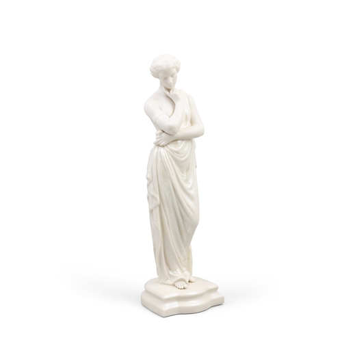 433 - A BELLEEK FIRST PERIOD FIGURE OF MEDITATION   modelled standing, wearing classical robes, on shaped ... 