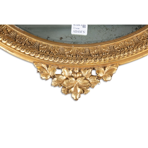 434 - A 19TH CENTURY GILTWOOD AND GESSO OVAL WALL MIRROR,  the bevelled oval plate enclosed with an acanth... 