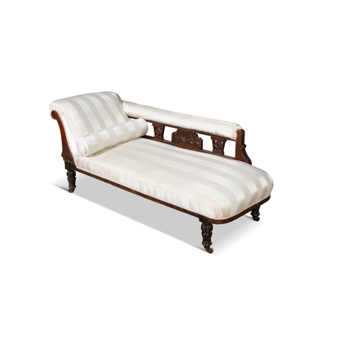 462 - A VICTORIAN MAHOGANY FRAMED SINGLE SCROLL END CHAISE LONGUE,  incised line decoration to the upright... 