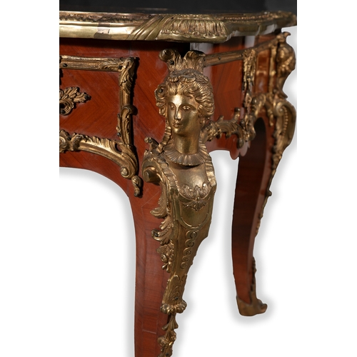 476 - A FRENCH KINGWOOD AND ORMOLU MOUNTED BUREAU PLAT  of shaped rectangular form, the top with tooled le... 