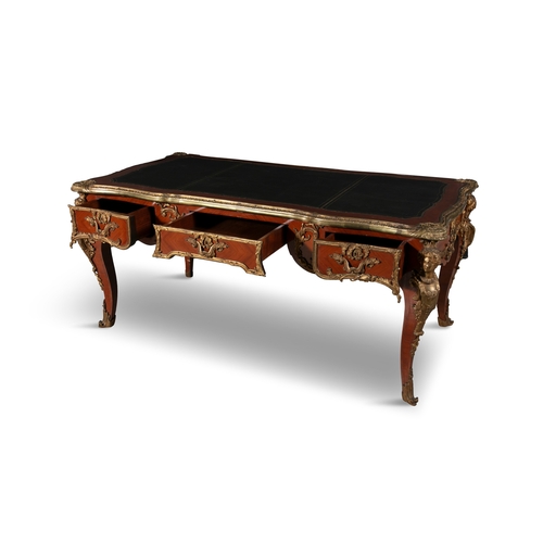 476 - A FRENCH KINGWOOD AND ORMOLU MOUNTED BUREAU PLAT  of shaped rectangular form, the top with tooled le... 