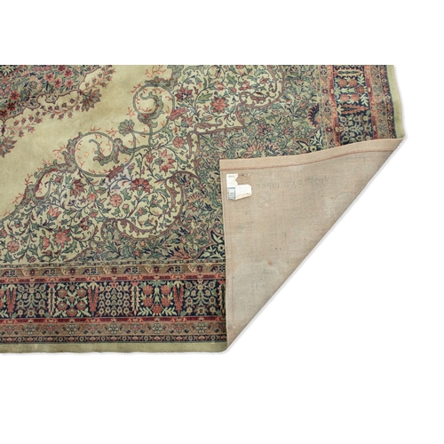 485 - A LARGE WILTON WOOL FLOOR CARPET. 453 X 366CM  of Axminister design, in soft green, navy and coloure... 