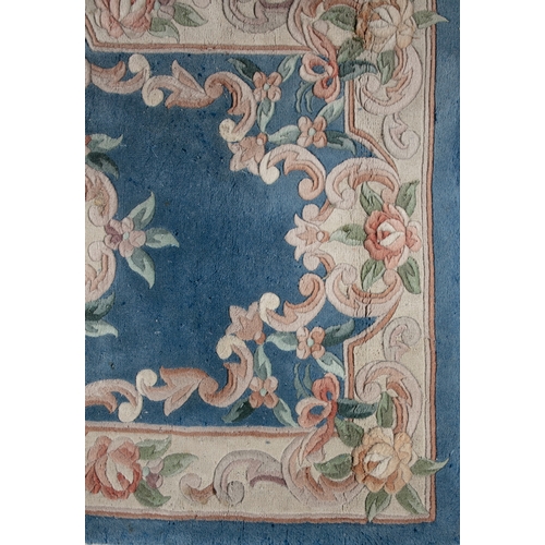 491 - A CHINESE BLUE AND CREAM GROUND WOOL RUG, 152CM LONG x 91CM WIDE   20th century, with heavy pile, wo... 