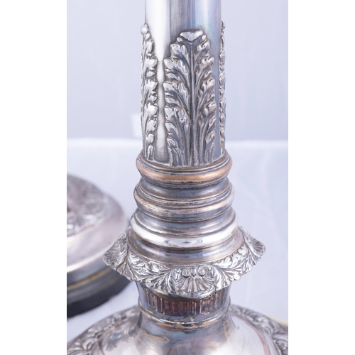 70 - A PAIR OF OLD SHEFFIELD SILVER PLATED TABLE LAMPS,  each column cast with acanthus leaves to top and... 